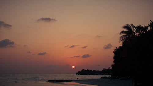 Beautiful sunset over an idyllic island resort