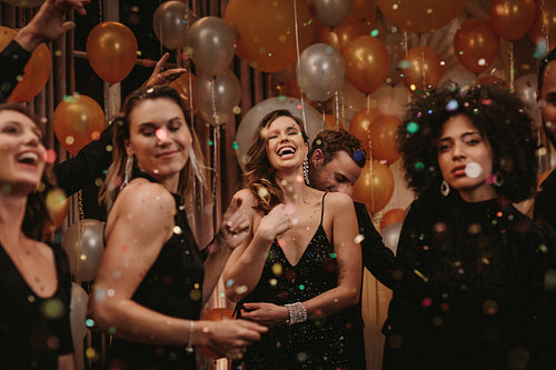 Group of friends having a great time at a party