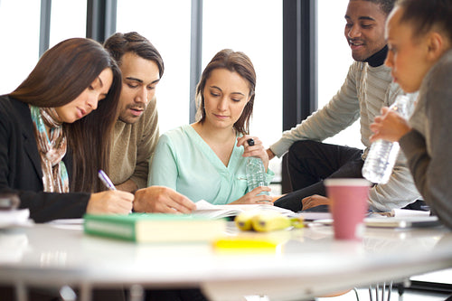 Young university students doing group study