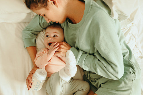 High angle view of a new mom caring for her baby