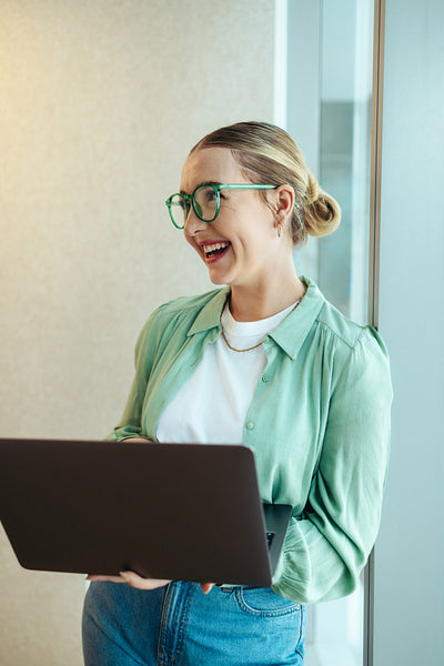Creative female director using laptop