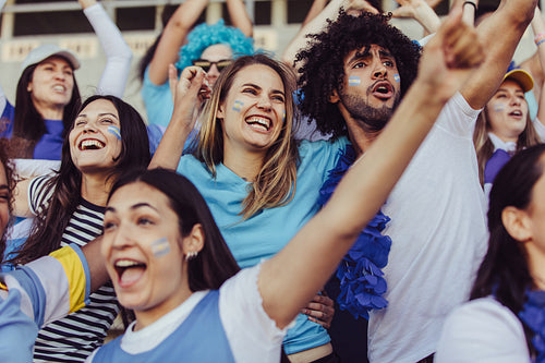Argentina football supporters cheering for their team