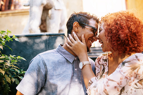 Romantic couple in happy mood having fun outdoors.