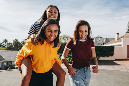 Girls having fun outdoors in the street