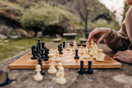 Senior couple playing chess together