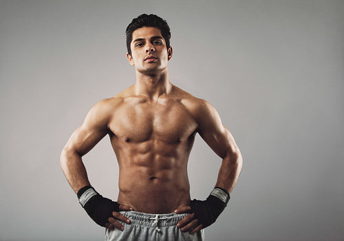 Muscular young bodybuilder with an attitude