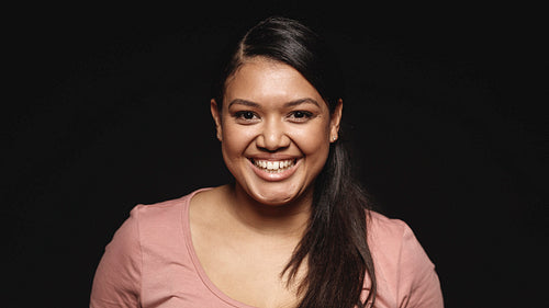 Close up of a smiling young woman