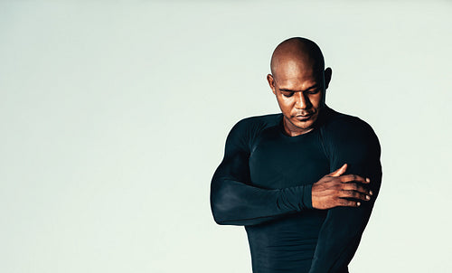 Handsome young men in gym t-shirt
