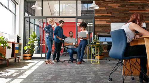 Group of creative people having a meeting