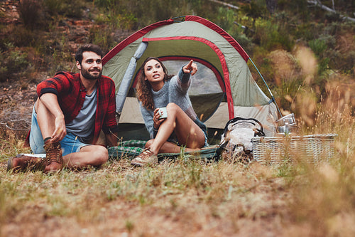 Young couple camping in nature