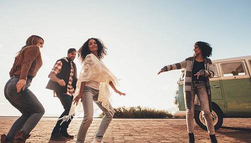 Friends enjoying weekend together outdoors