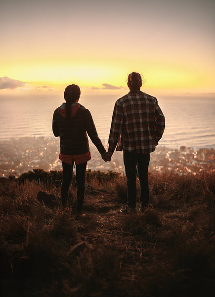 Couple in love watching sunset