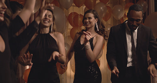 Friends dancing in the night club