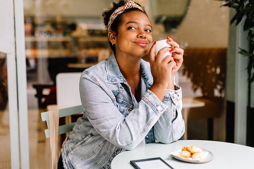 Authentic coffee lover enjoying a moment of relaxation