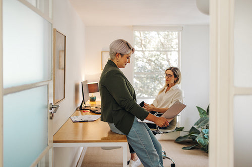 Businesswomen working together in an all female office