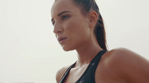 Female athlete resting after workout