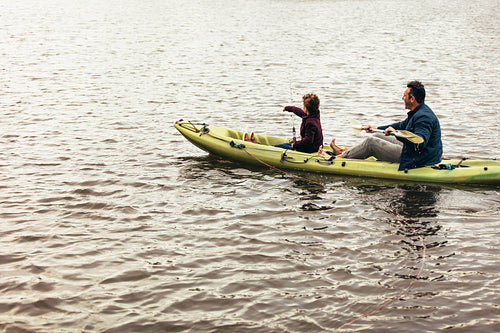 Father and son fishing in the lake
