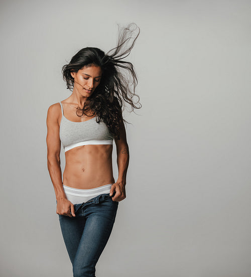 Sexy young woman posing in her underwear