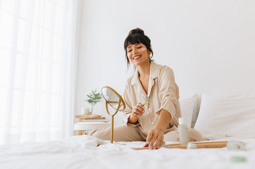 Woman doing beauty routine at home
