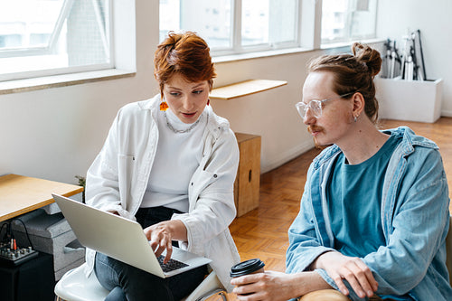 Colleagues collaborating in a bright co-working space