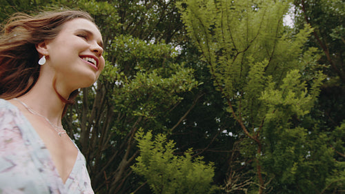 Woman dancing in the springtime woods