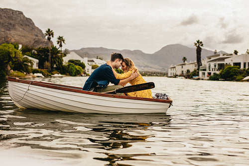 Romantic couple in love on a boat date