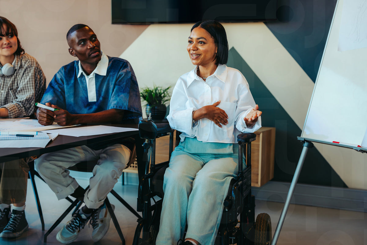 College students in an inclusive classroom setting with disabled stude ...