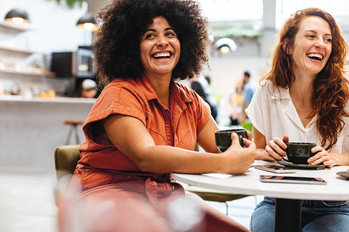 Friends enjoying each other's company over coffee
