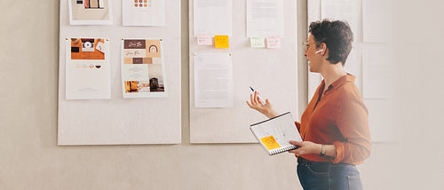 Creative businesswoman presenting her work during a conference call