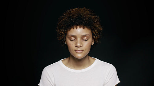 Woman with her eyes closed