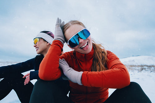 Playful winter break for women athletes after snowy training session