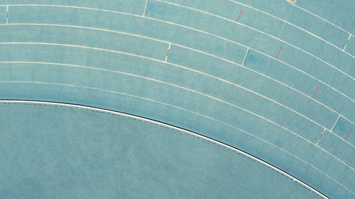 American sprinter doing a victory lap with flag