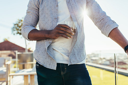 Man holding a glass of wine