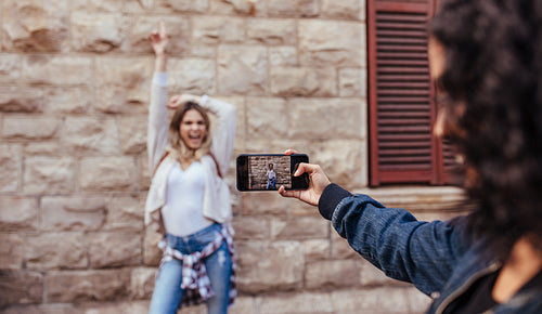 Woman posing for photos outdoors