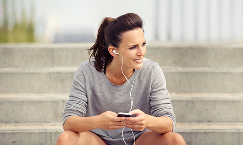 Woman Listening to Music on her Phone