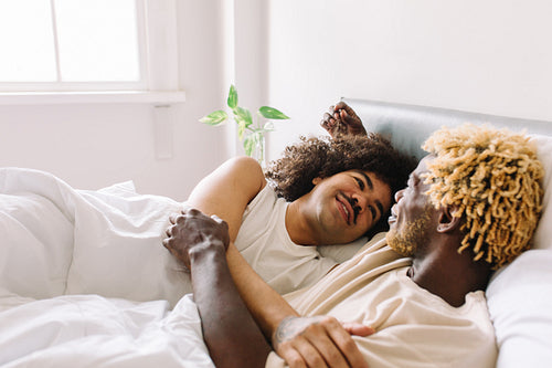Young gay couple being romantic in the morning