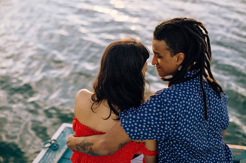 Rearview shot of an affectionate young couple bonding on a vacat