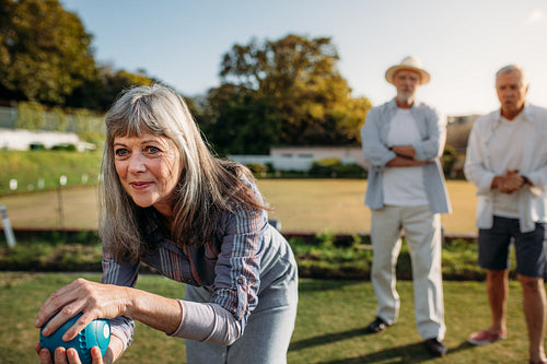 Group of senior friends playing boules