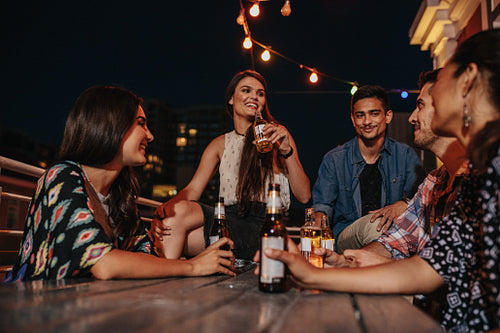 Friends enjoying party with drinks