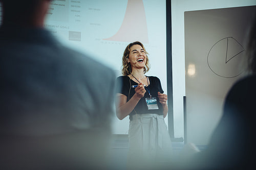Businesswoman smiling during presentation speech