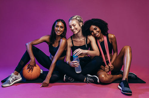Fitness women resting after workout