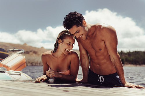 Couple enjoying by the lake