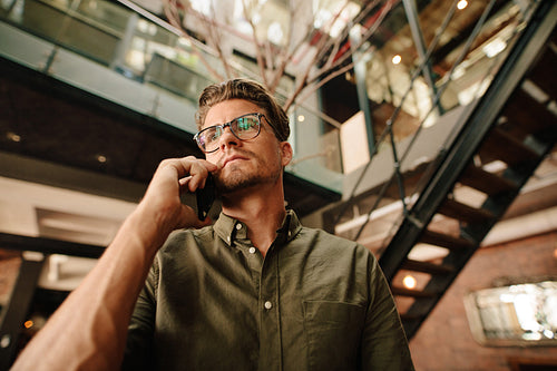 Young man making a phone call