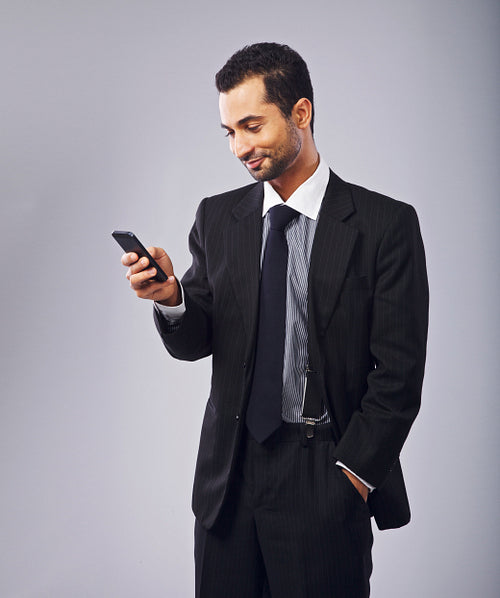 Businessman Reading a Text Message