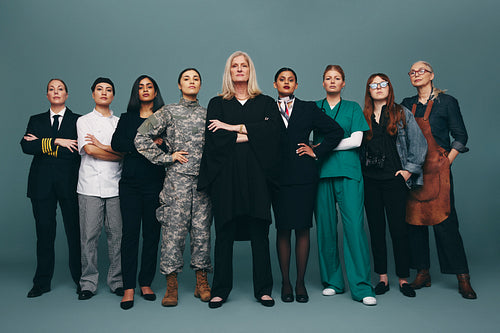 Professional women looking at the camera in a studio