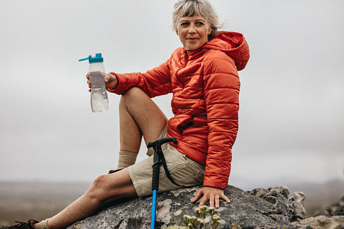 Woman hiker relaxing after the trek