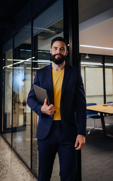 Professional businessman standing in an office