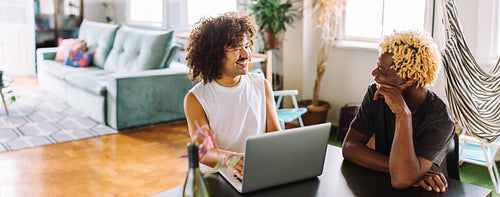 Queer couple having a cheerful chat together