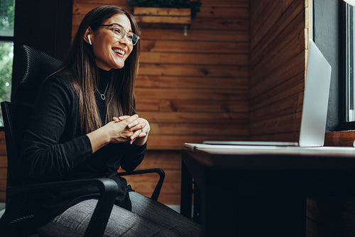 Young female entrepreneur having an online meeting