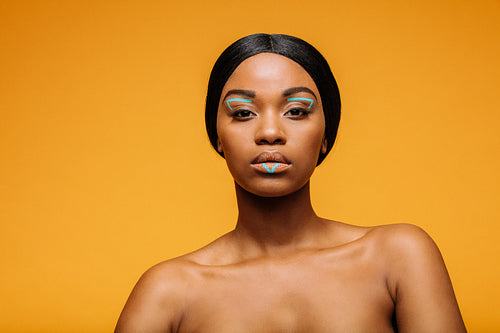 Beauty shot of woman with artistic make-up